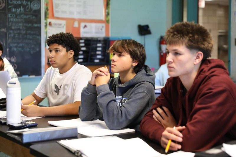 3 students paying attention