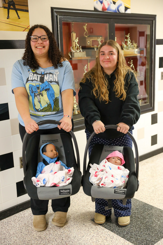 girls with baby simulators