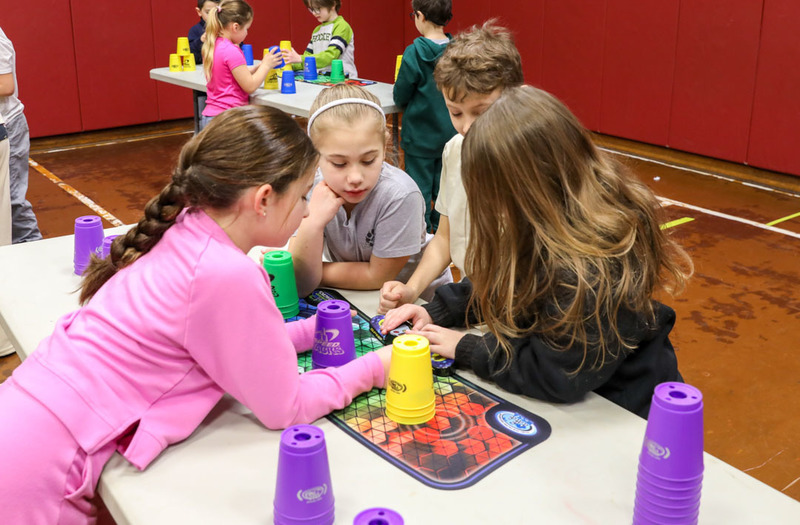 students learning cups