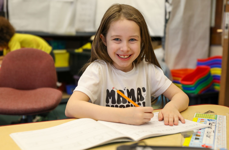 first grader writing