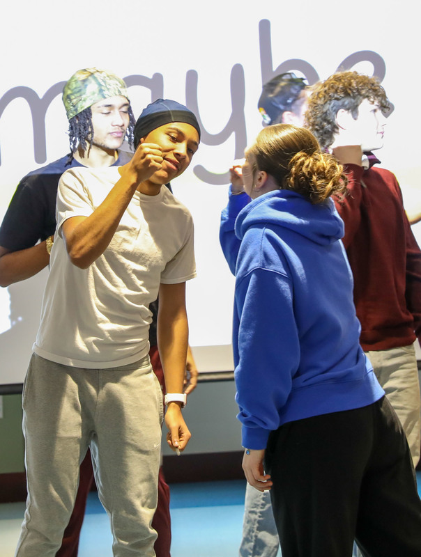 students encouraging others