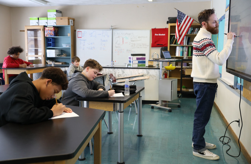 Mr. Atkinson teaching science