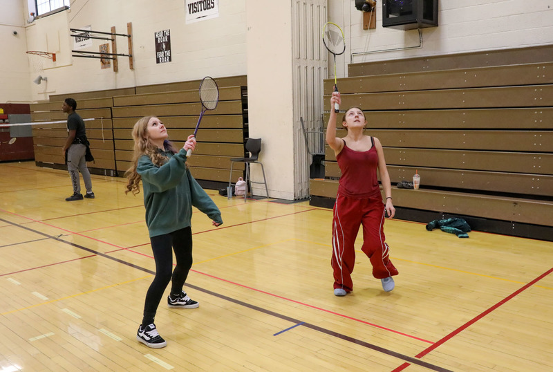 students playing badminton