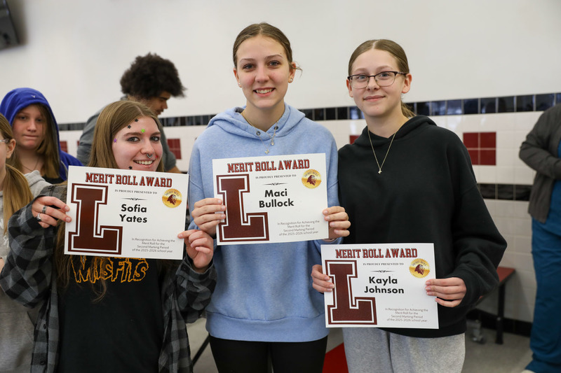 honor roll students pose