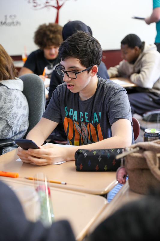 student using calculator