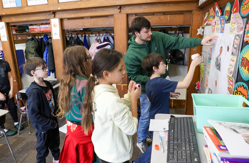 teacher engaging in buddy program