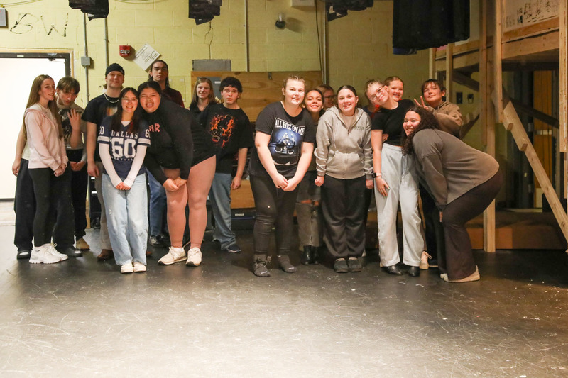 students behind stage