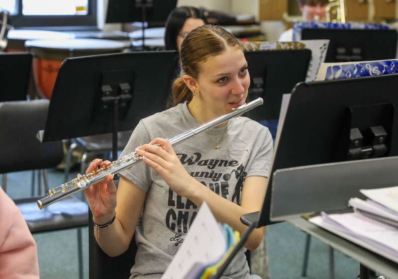 student practicing in band