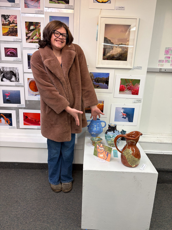 student with art work