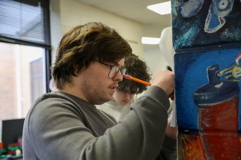 student working in physics