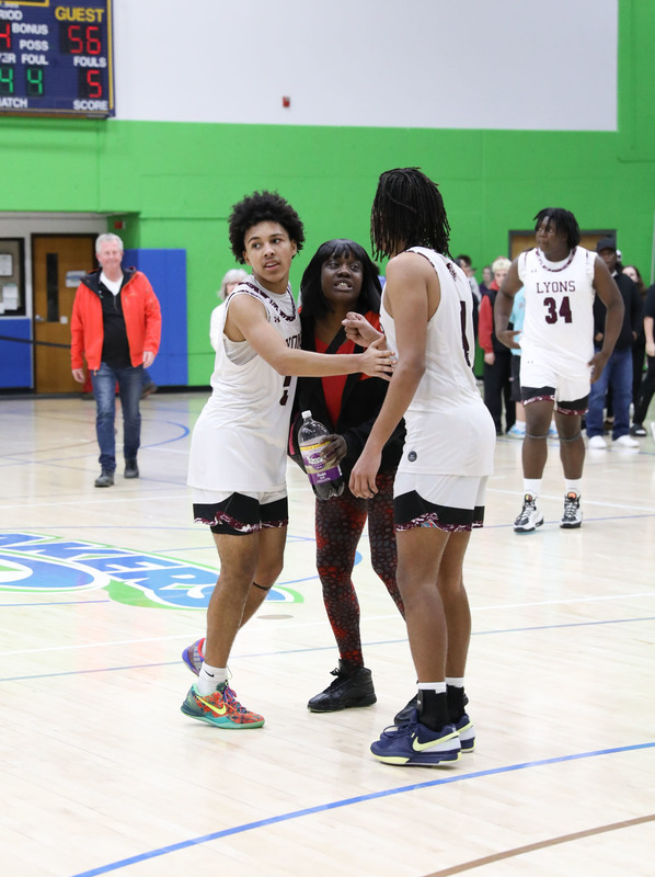 player celebrating with mom after