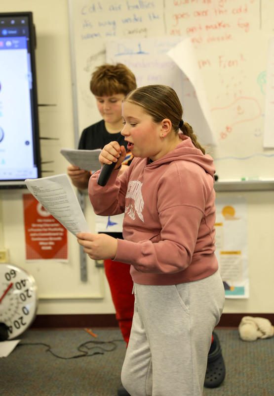 student reading script