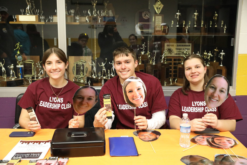 students selling fatheads