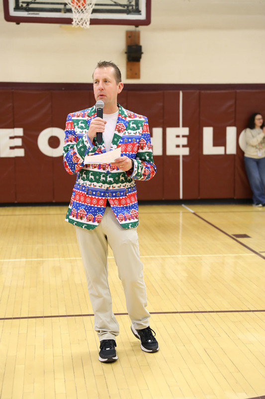 Mr. Young announcing at winter peprally
