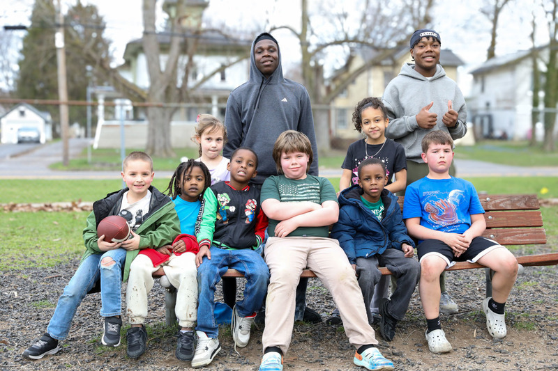 students posing on playground