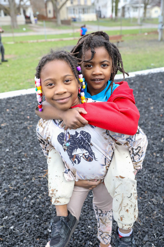 students posing on playground