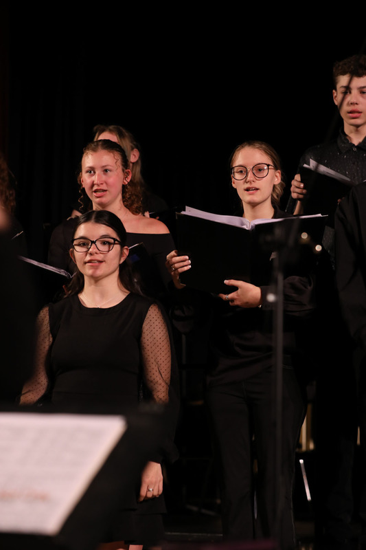 student performing in chorus concert