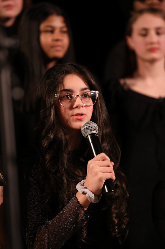 student performing in chorus concert