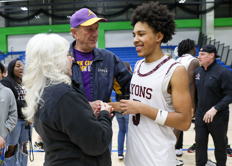 Stavell with opposing teams fans supporting him
