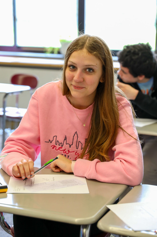 student in math class