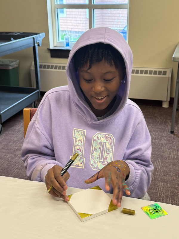 student doing library craft