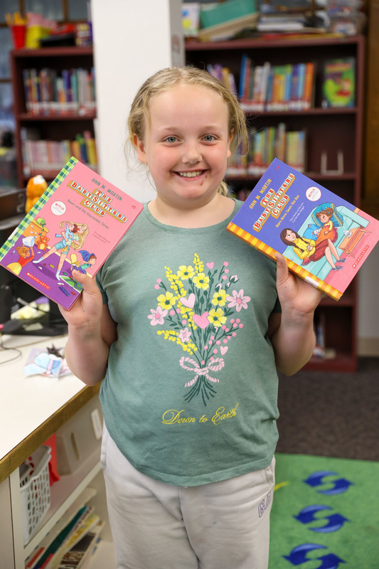 student with her books