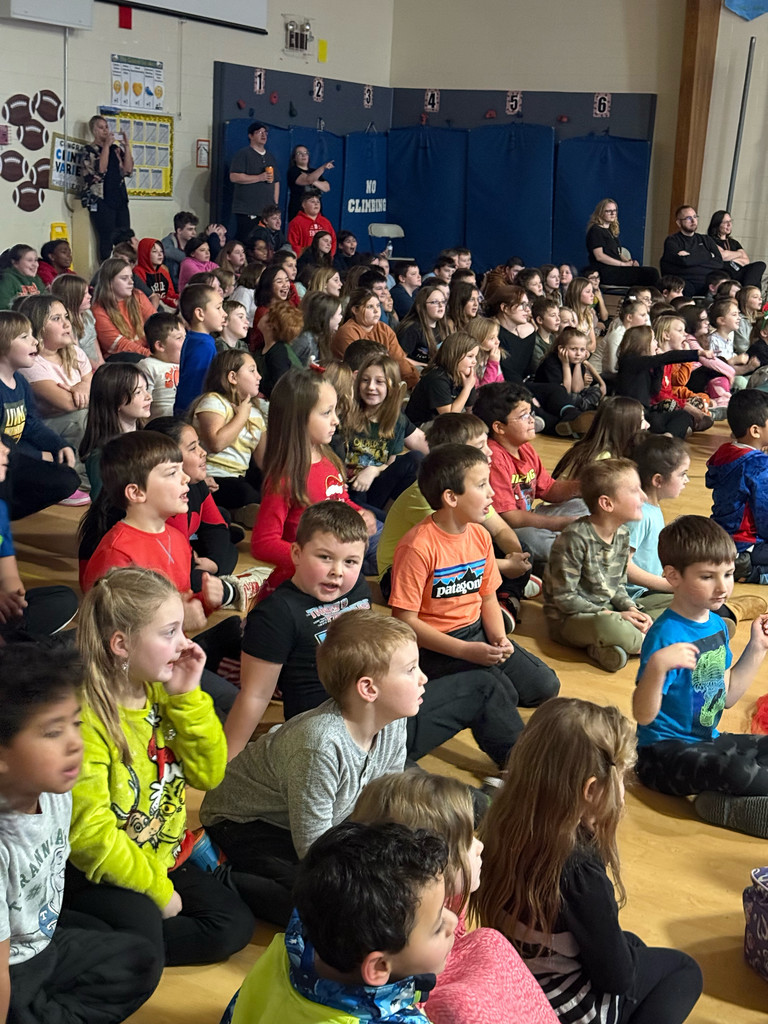 students watching a play.
