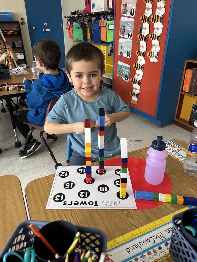 Students are constructing towers to explore numbers and strengthen their math skills