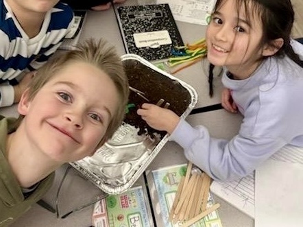 students working on erosion projects.