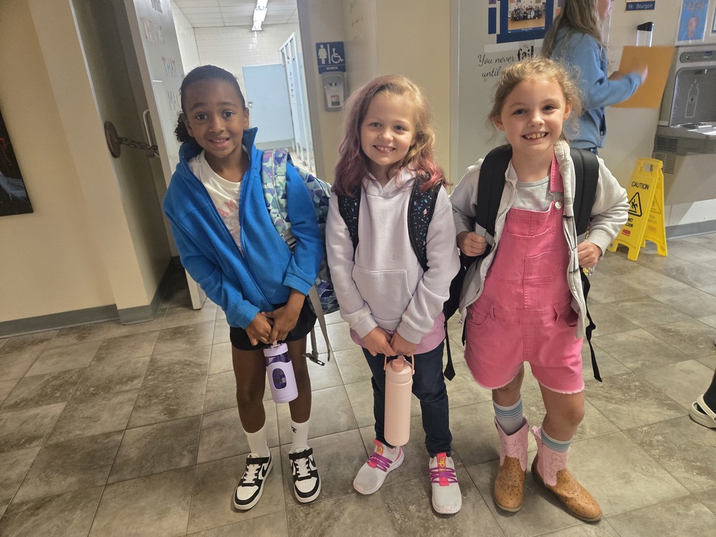 Pictures of students posing for pictures on the first week of school.