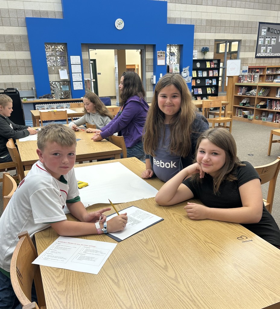 students in these pictures are involved in team building, exploring new books, and a hands-on STEM projects.