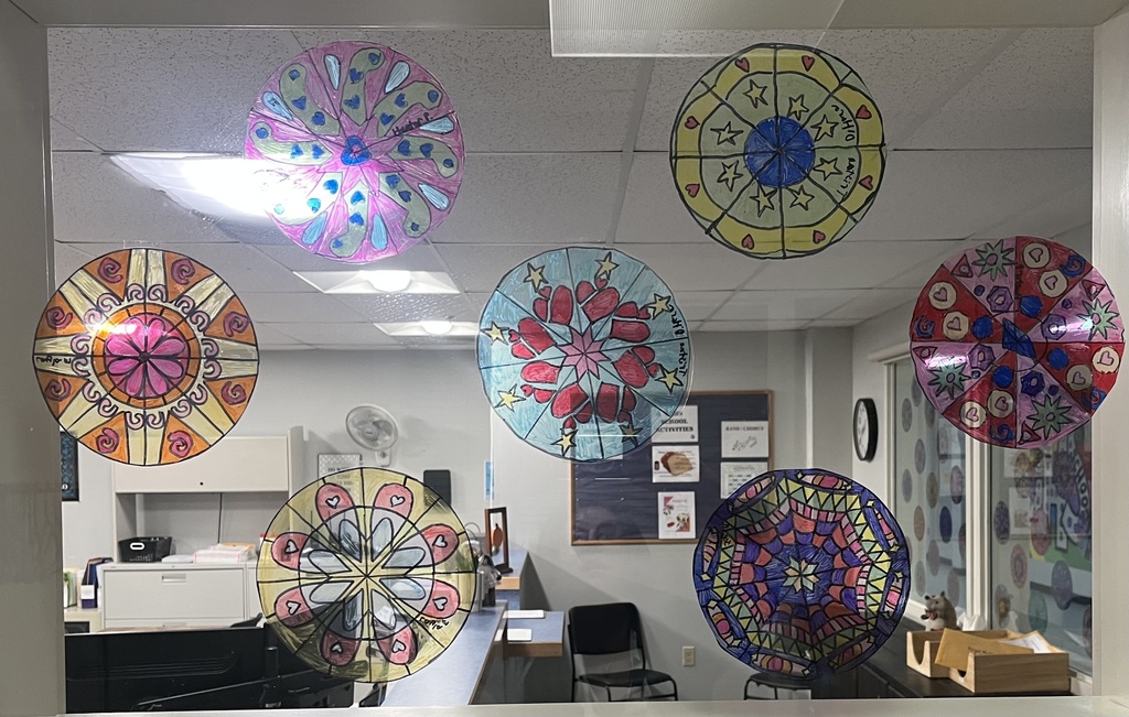 The picture shows the students Window Rose Art Projects. 