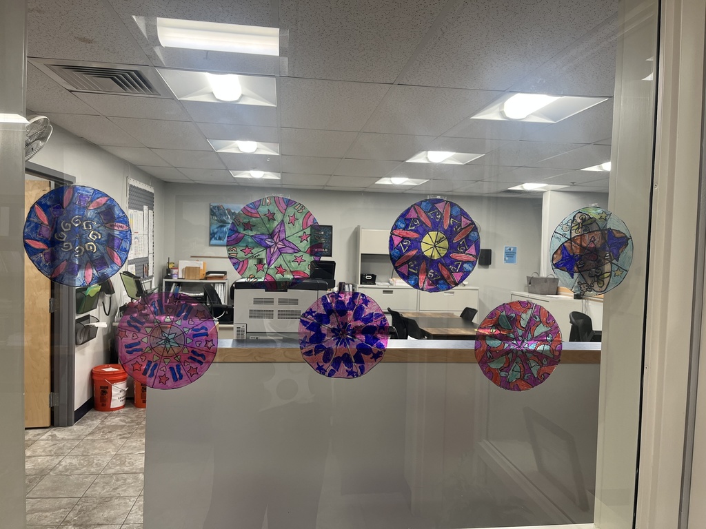 The picture shows the students Window Rose Art Projects. 