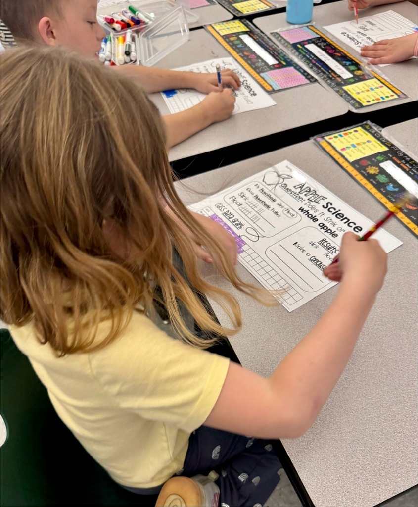 Students involved in hands on lessons learning about the scientific method.