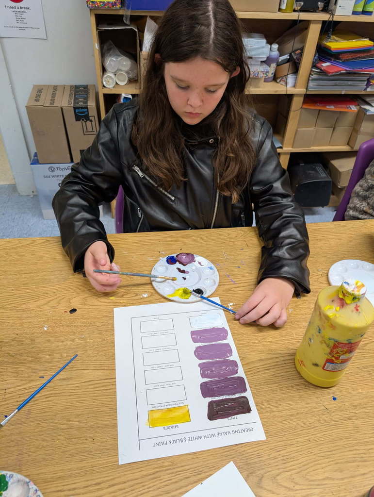 Students involved in art projects.