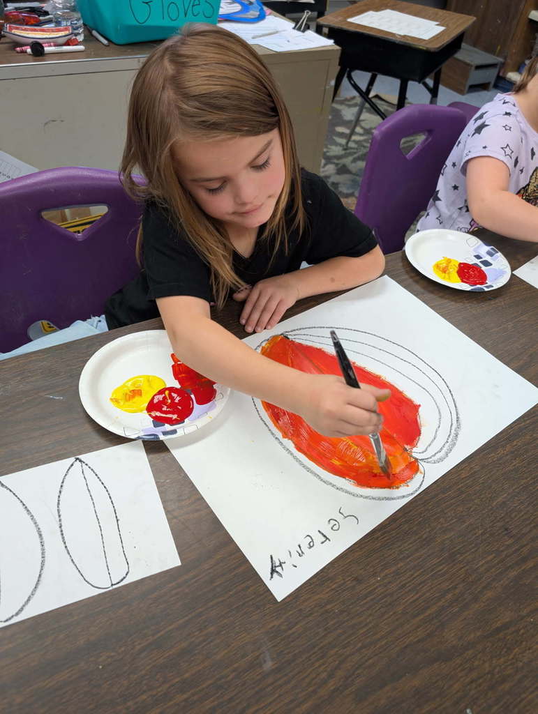 Students involved in art projects.