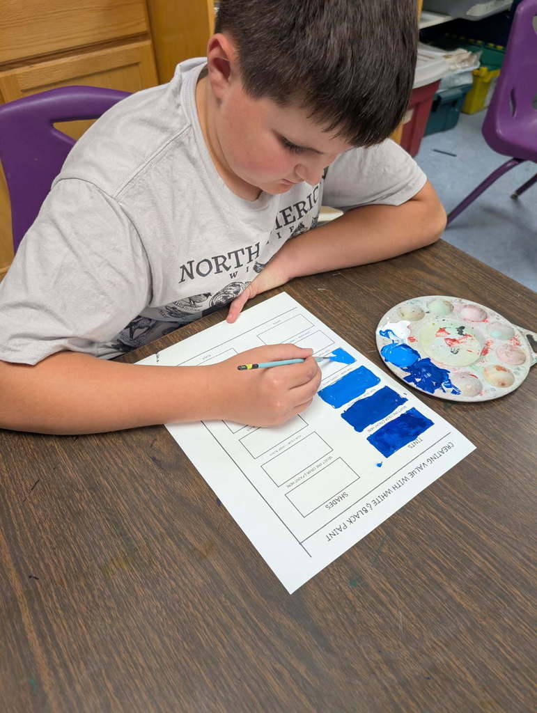Students involved in art projects.