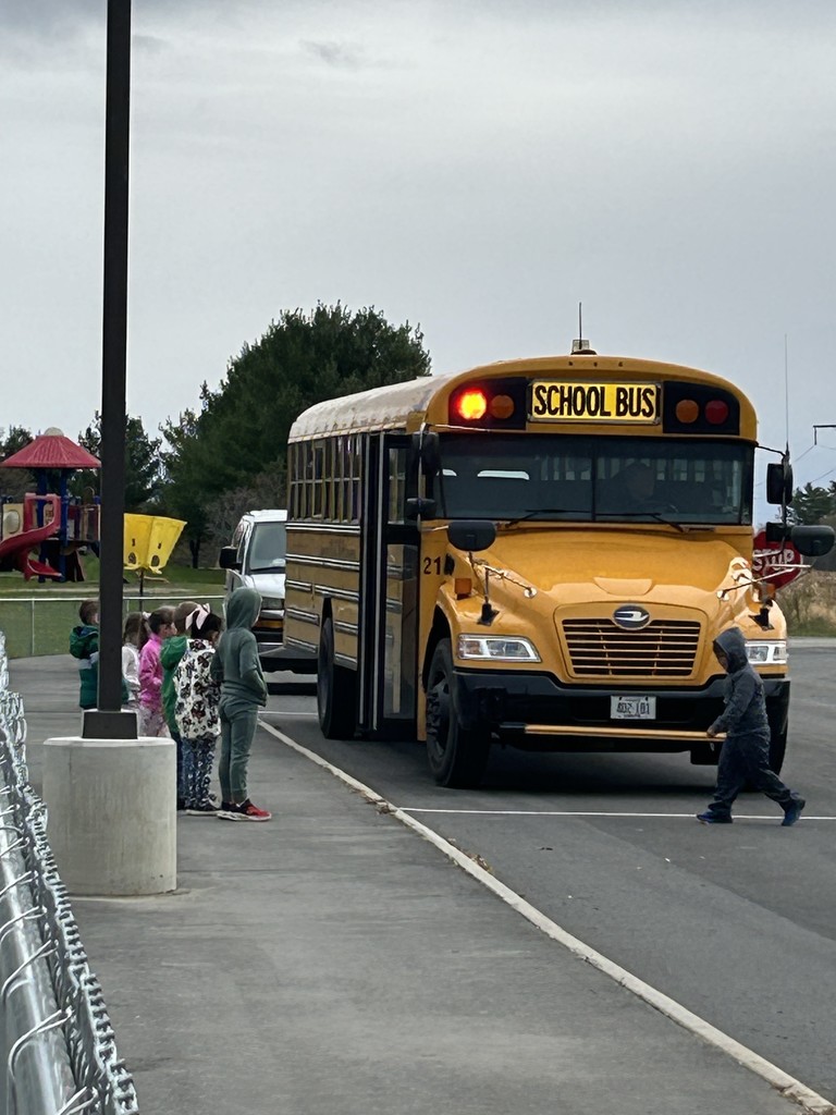 Pictures of students getting on the bus.