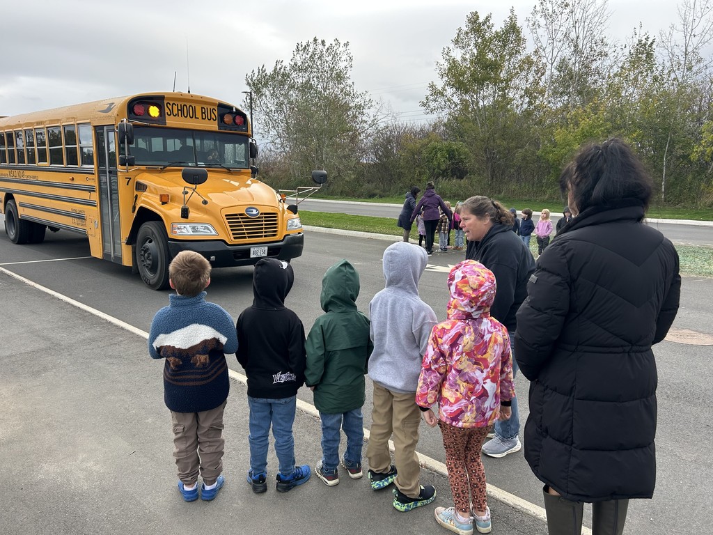 Pictures of students getting on the bus.