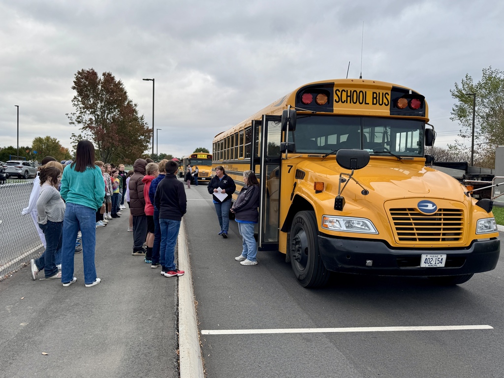 Pictures of students getting on the bus.