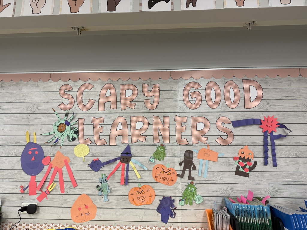 Picture of the project board with the students scary monsters. 