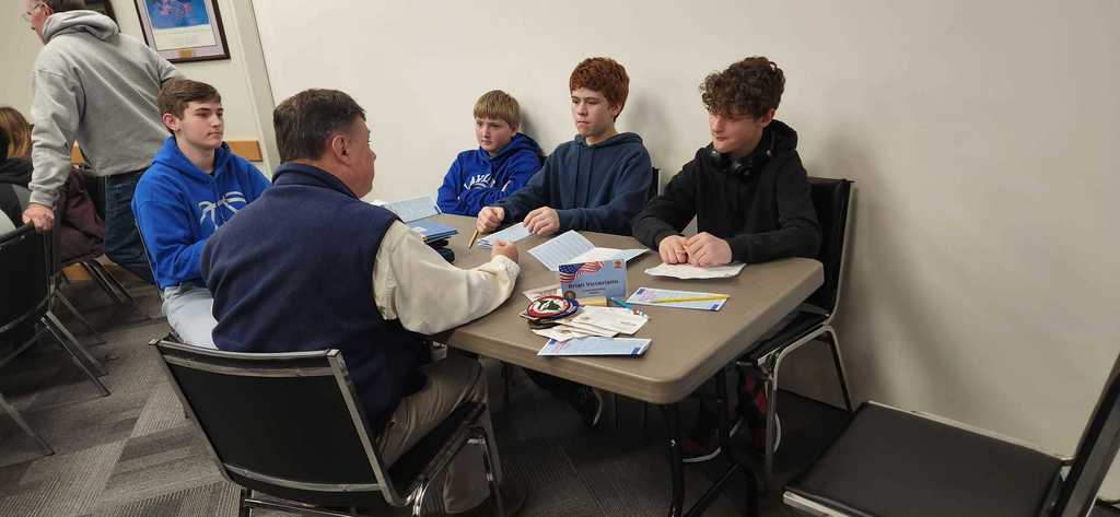 pictures of students interviewing and meeting veterans.