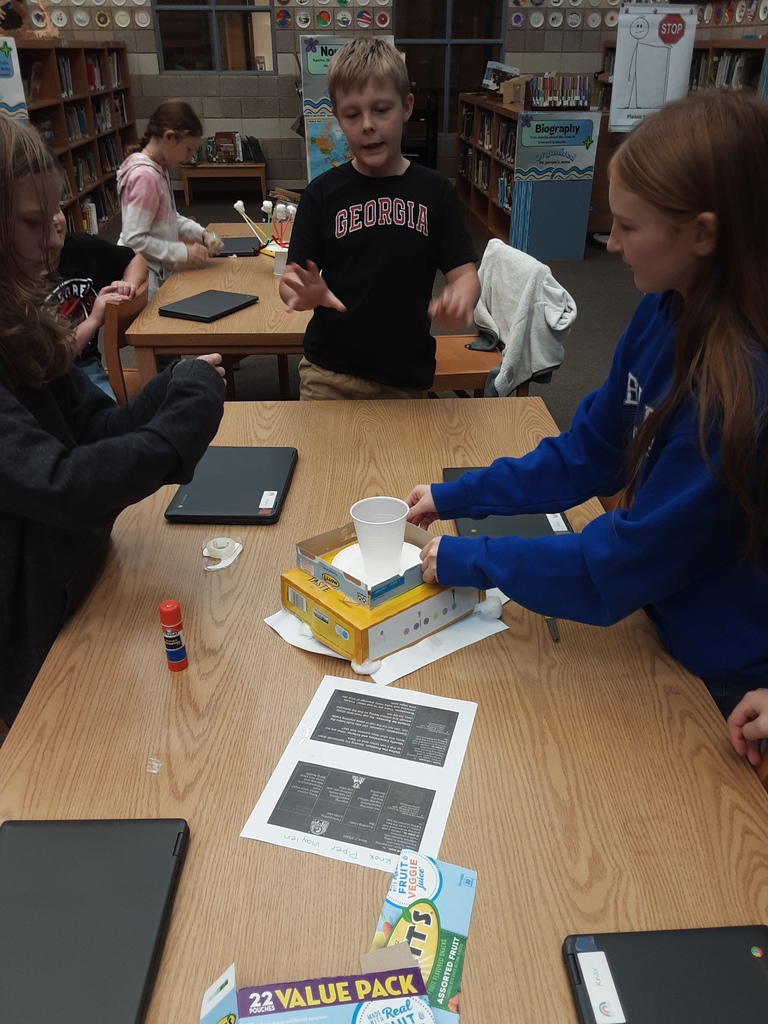 students working on projects inspired by book Red Rover: Curiosity on Mars