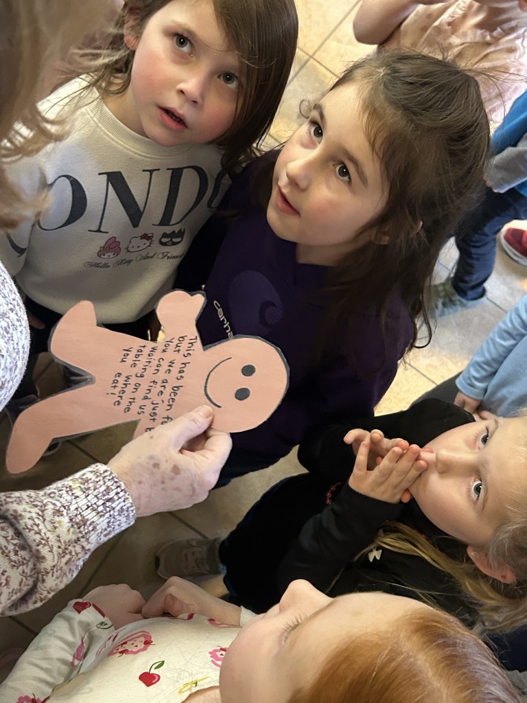 students making gingerbread cookies.