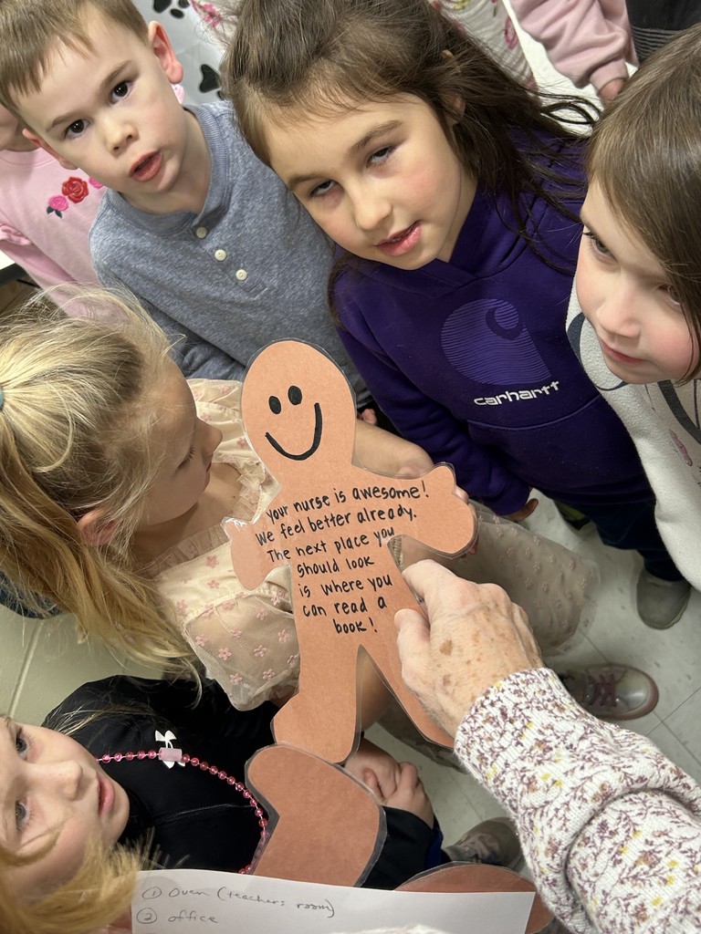 students making gingerbread cookies.