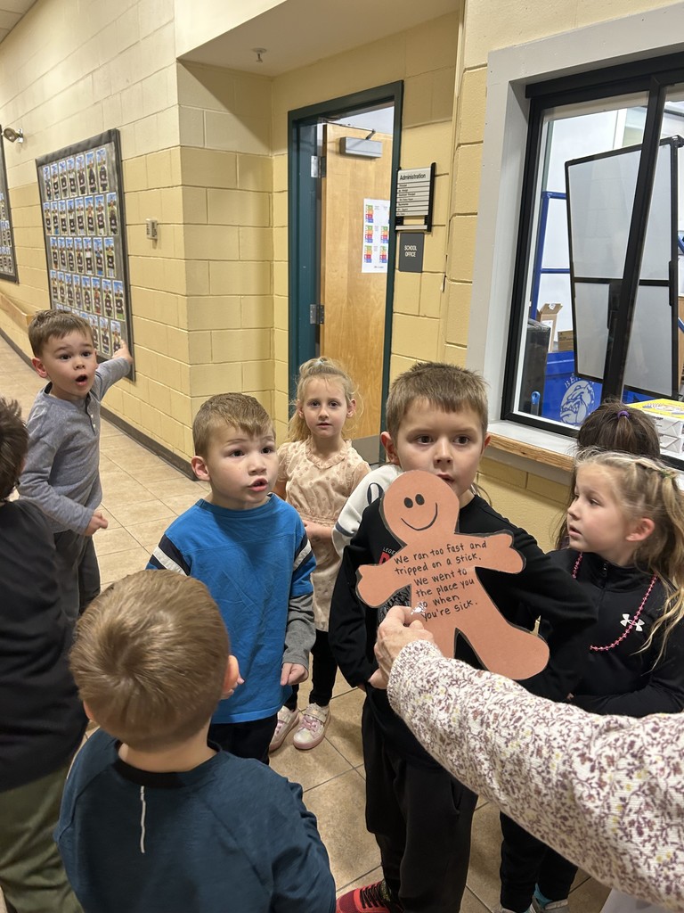 students making gingerbread cookies.