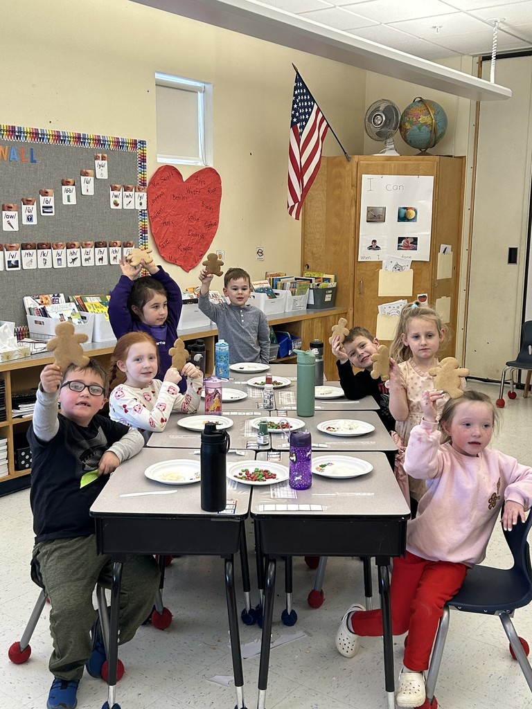 students making gingerbread cookies.