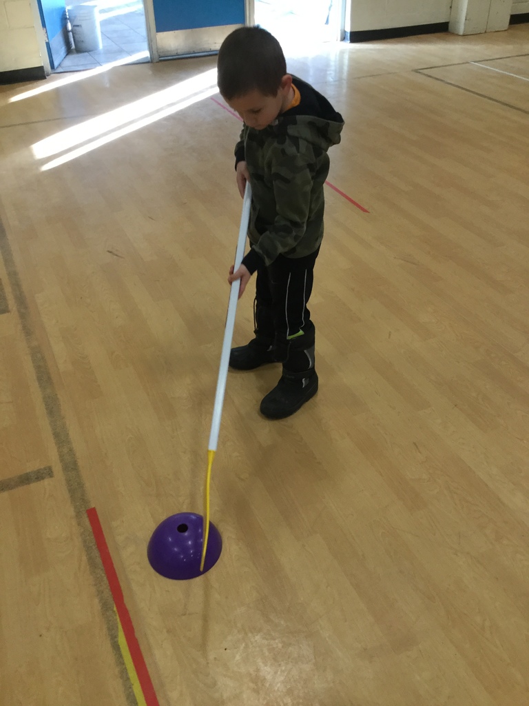 students learning about hockey in Physical Education class!