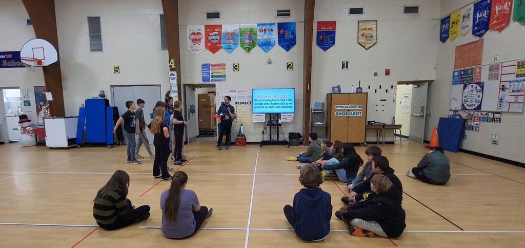 students learning about hockey in Physical Education class!
