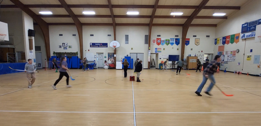 students learning about hockey in Physical Education class!